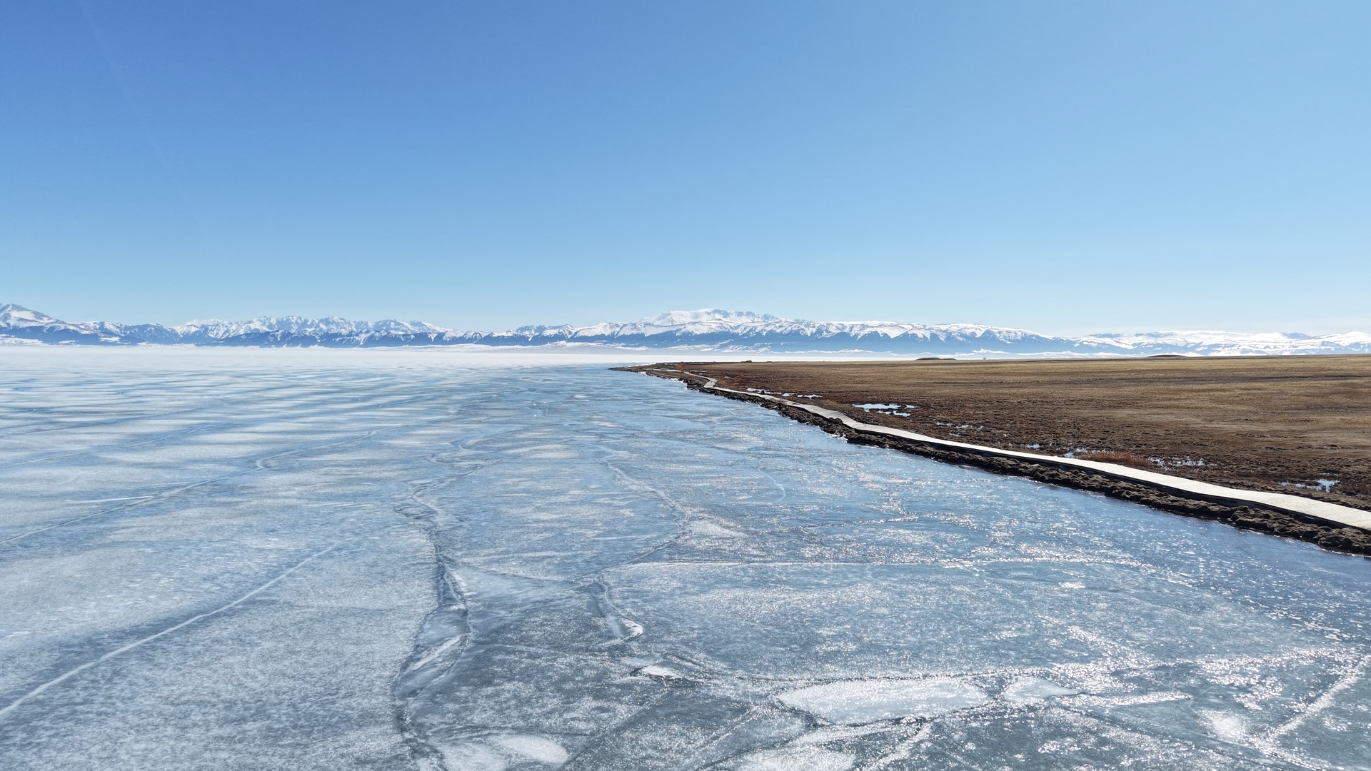 Frozen lake and mountains in China